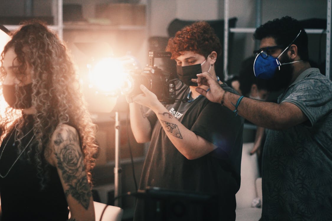 
People Wearing Face Masks in a Studio