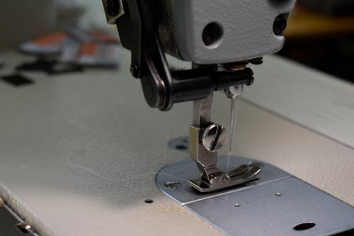 Foto profissional grátis de agulha, máquina de costura