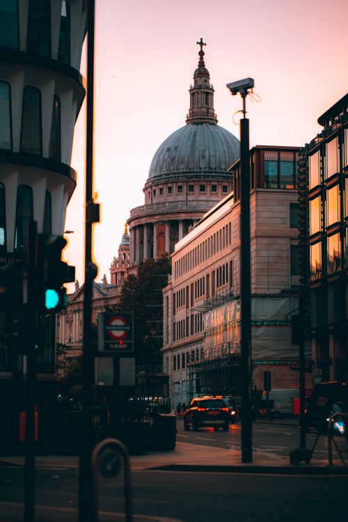 Free Beautiful view of St. Paul's Cathedral against a sunset sky in London, showcasing urban architecture. Stock Photo