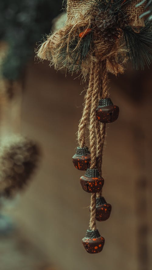 Brown Rope with Red Bells in Close-up Photography