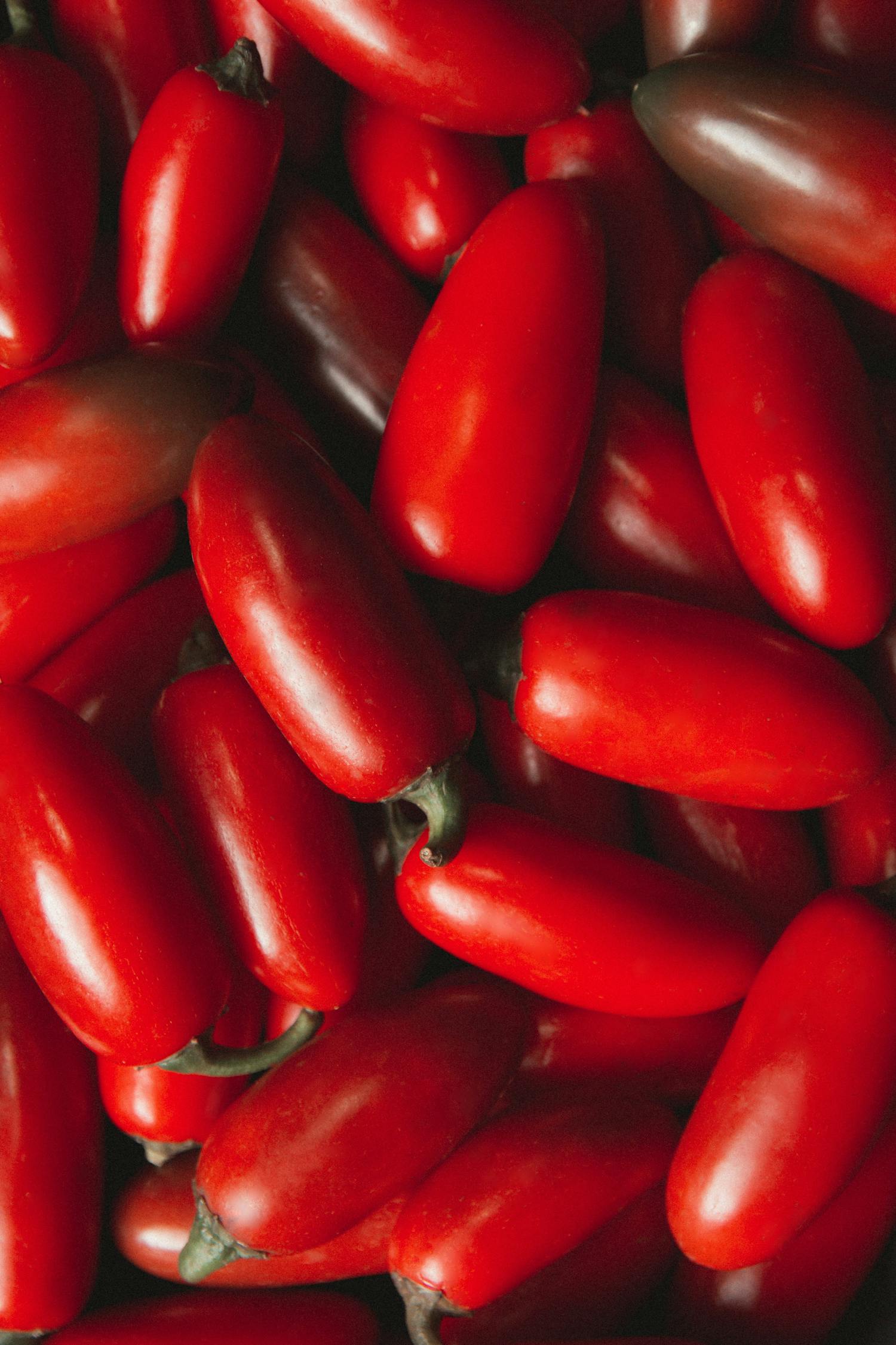 Close-up of fresh and vibrant red San Marzano tomatoes