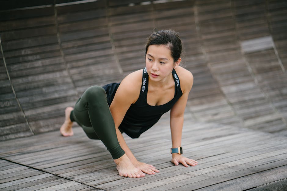 Woman Wearing Black Tank Top Crawiling