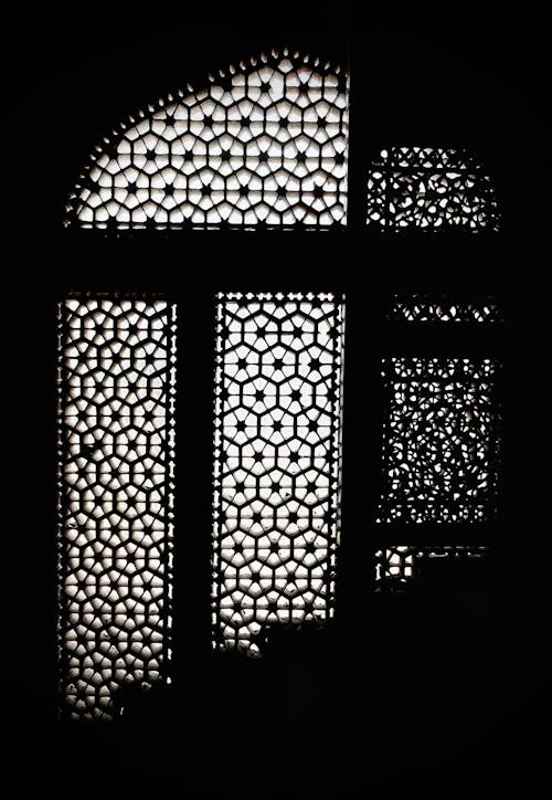 Mosaic on a Window in the Dark 