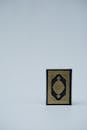 Koran on White Surface