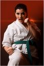 A Woman Wearing a Gi