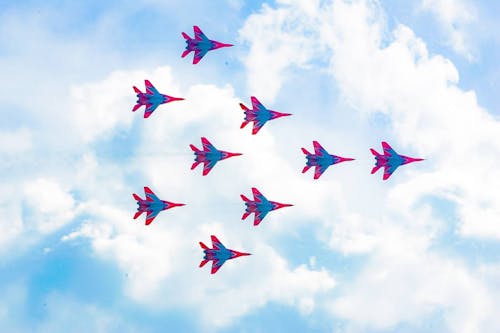 Free Blue and Red Jet Planes in the Sky Stock Photo