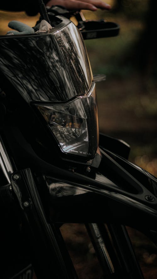 
A Close-Up Shot of a Black Motorcycle