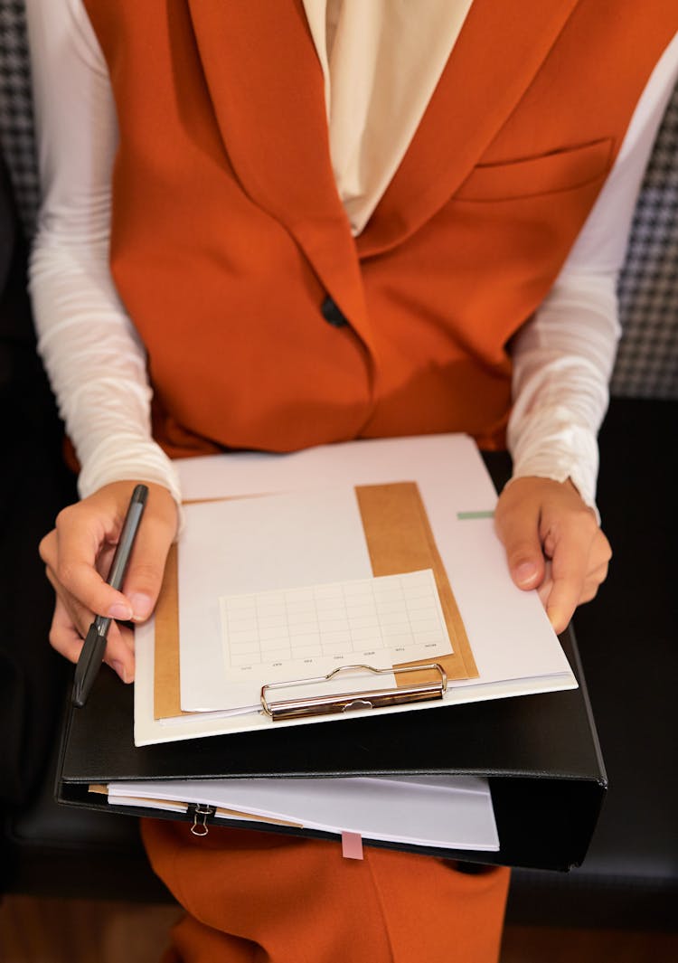 Woman Holding Notes