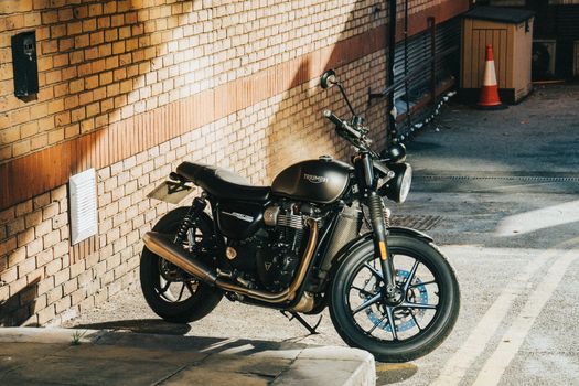 Black Motorcycle Parked on Street