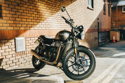 Black Motorcycle Standing on Street