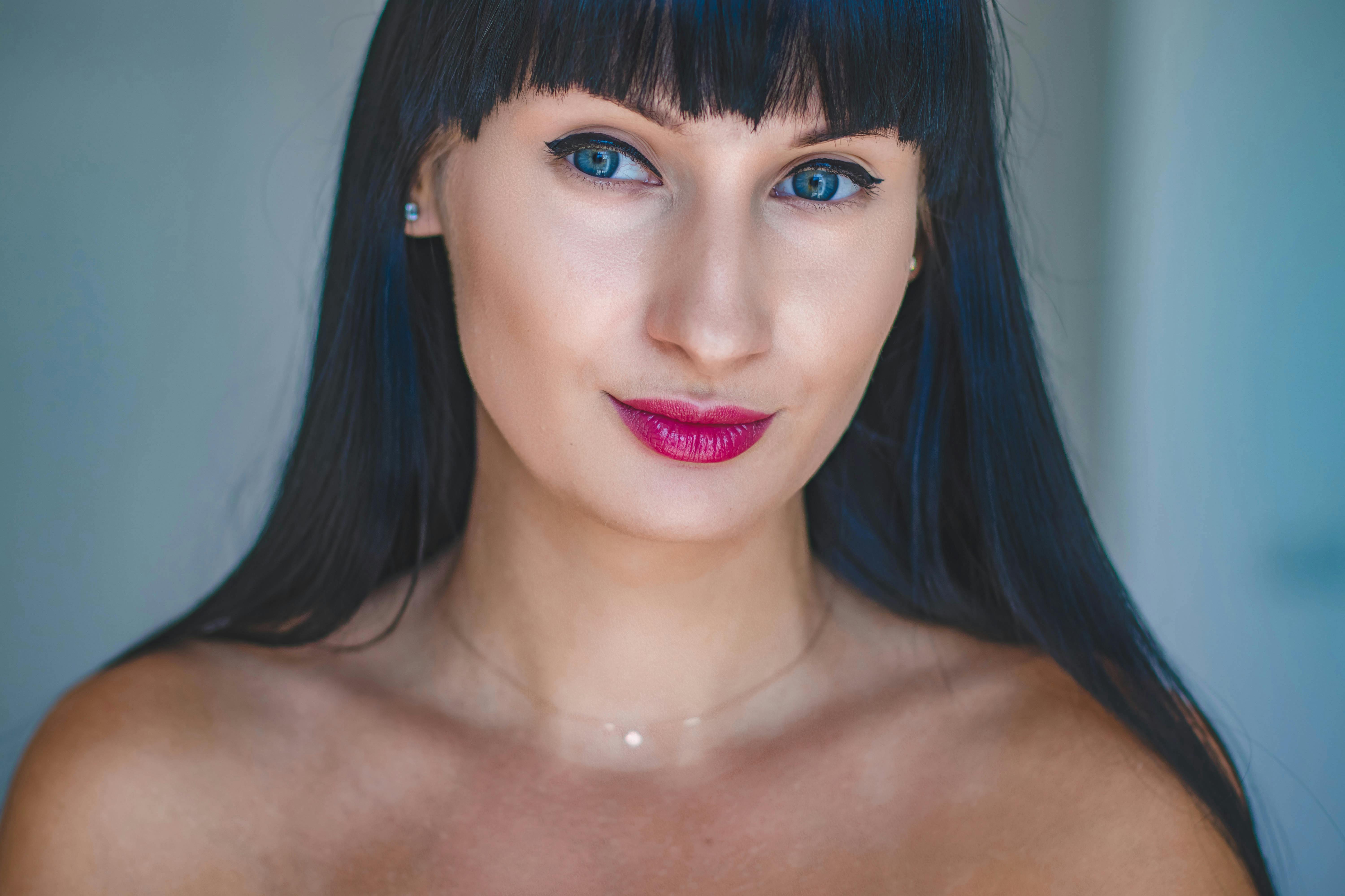 Photo Of Woman With Blue Eyes And Black Hair Free Stock Photo
