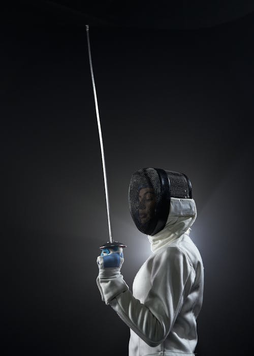 Free Fencer Holding a Sword Stock Photo