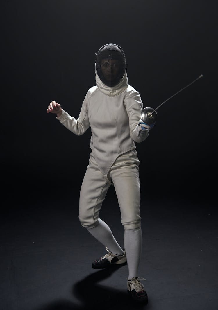 A Fencer Holding A Foil