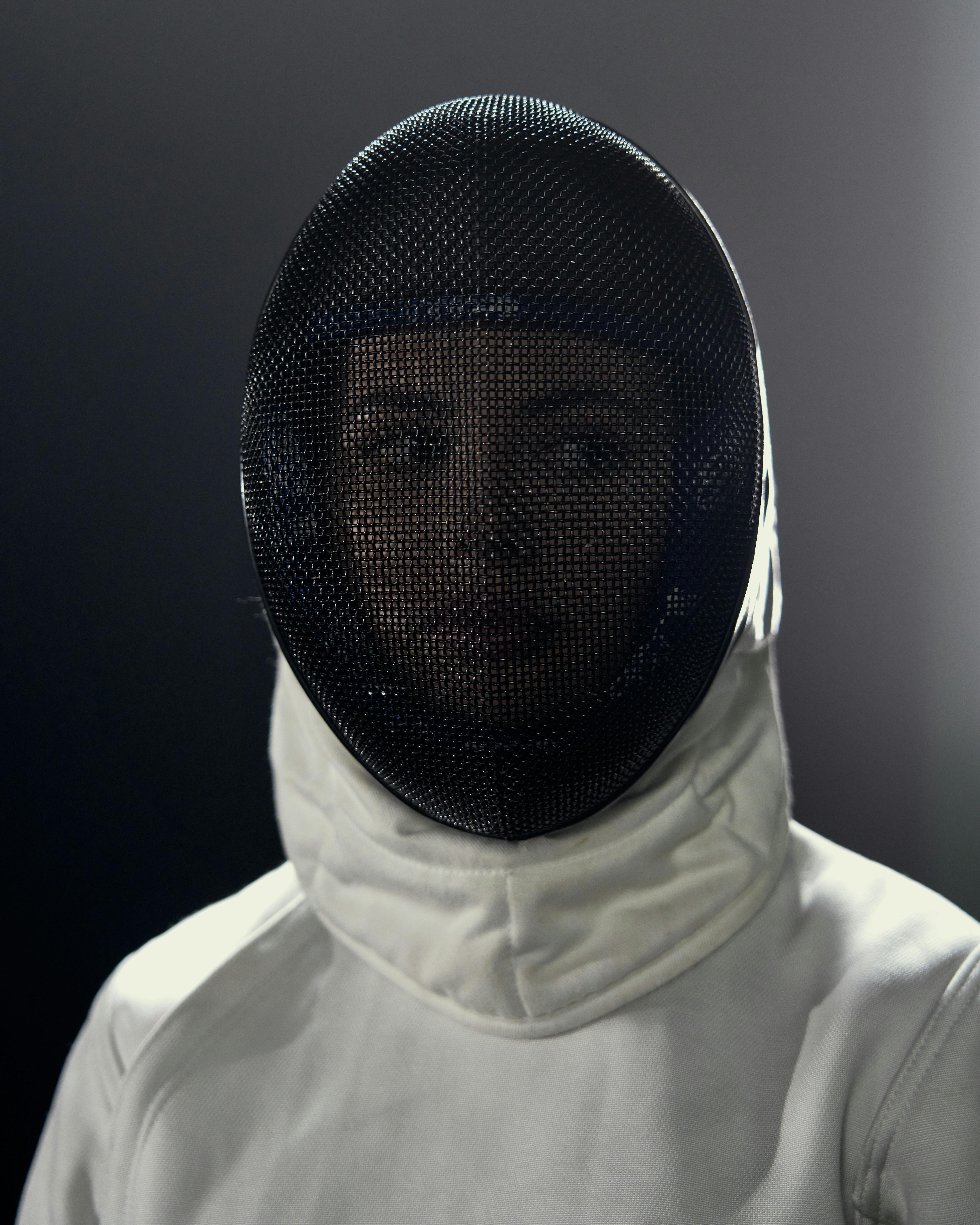 Woman Wearing a Fencing Mask · Free Stock Photo