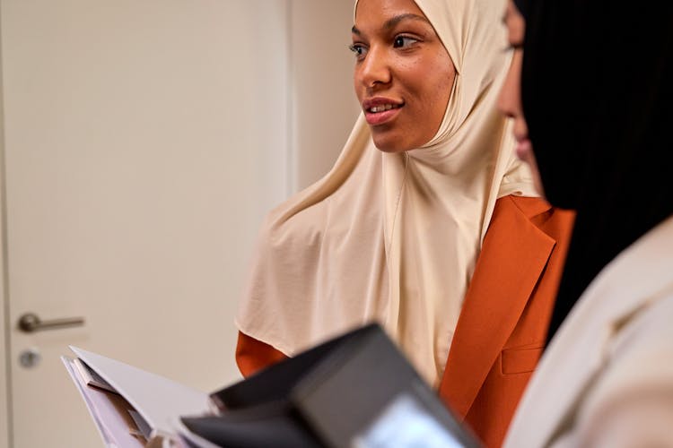 Women With Documents In Office