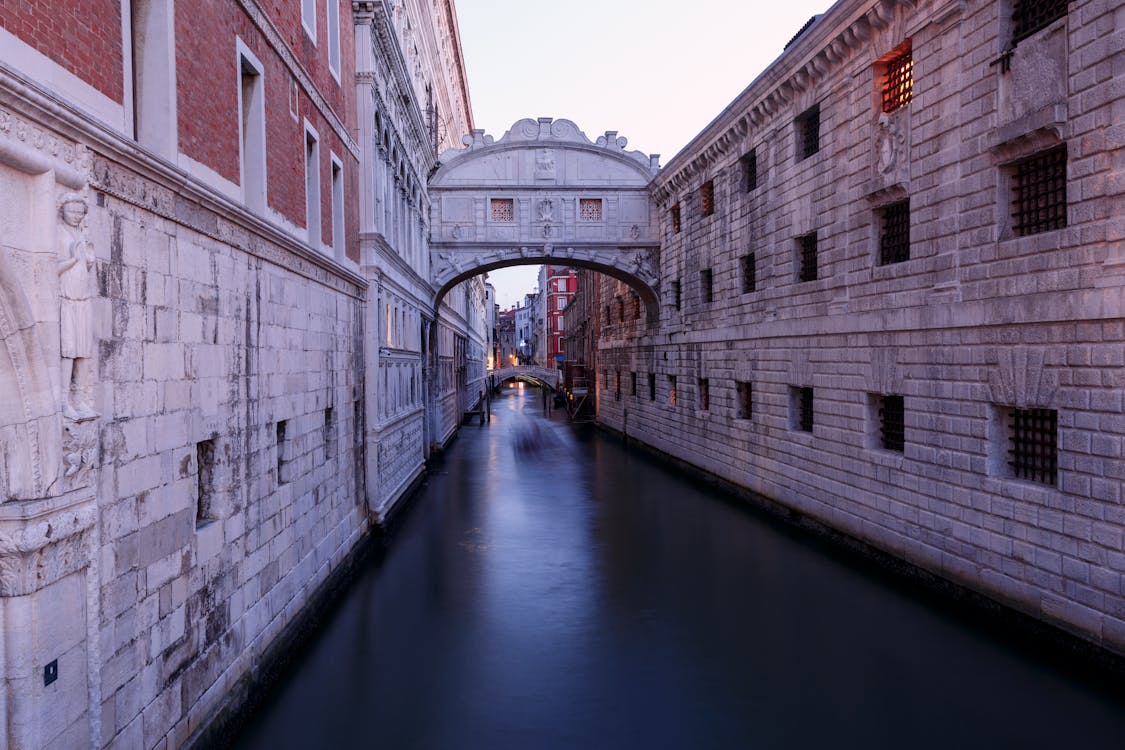 Photo of Canal Between Buildings