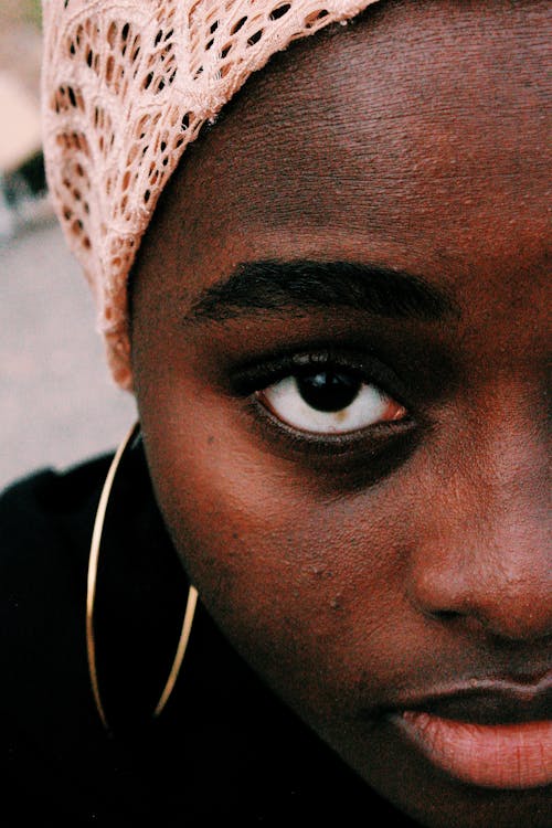 Woman's Face in Close Up Photography