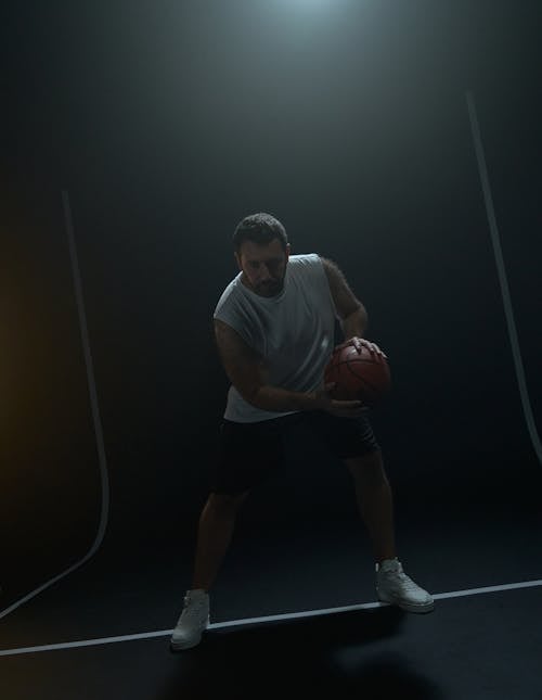 Kostnadsfri bild av ärmlös tröja, basketboll, basketspelare