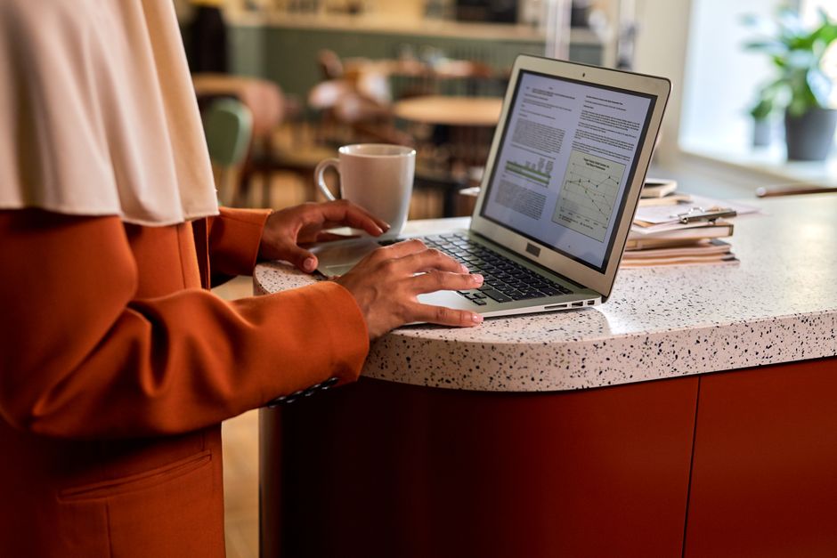 storefront counter laptop documents