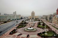 Cars on Road Near City Buildings