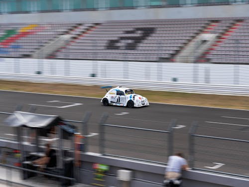 A White Racing Car on the Race Track