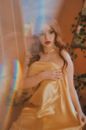A Beautiful Woman Covered with a Blanket