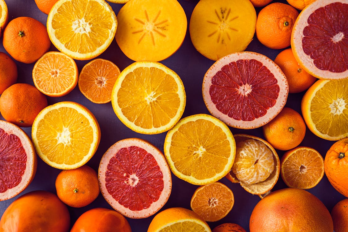 Δωρεάν στοκ φωτογραφιών με flatlay, persimmons, αποφλοιωμένος