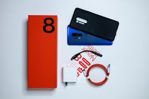 Smart Phone with a Box and a USB Cable 