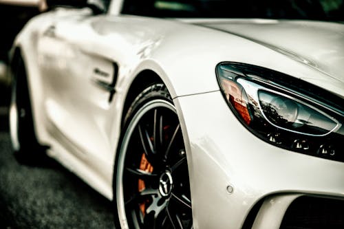 Free White Car in Close-Up Photography Stock Photo