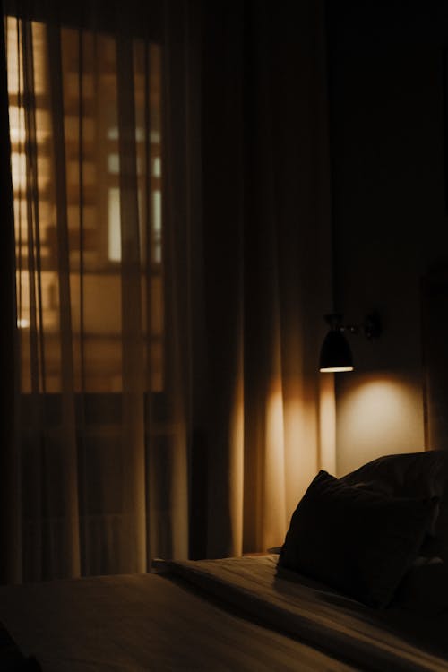 Dark Hotel Room with Curtains Drawn · Free Stock Photo