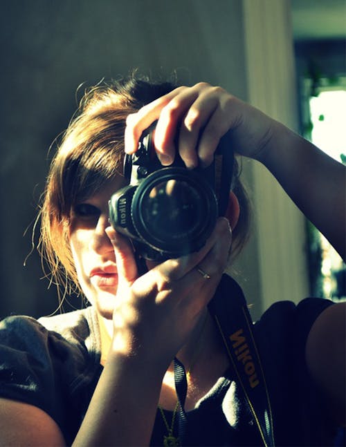 Beautiful Woman Taking a Photo