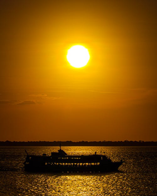 Kostenloses Stock Foto zu boot, fähre, goldene stunde