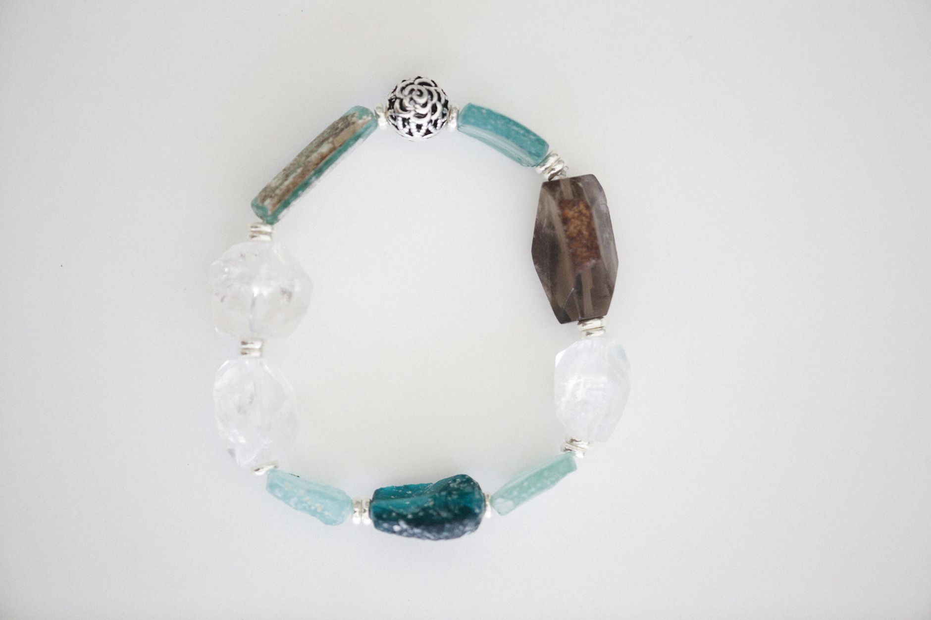 aries woman wearing crystal bracelet for empowerment and emotional balance