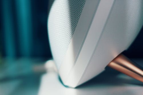 Shallow Focus Photography of White Speaker