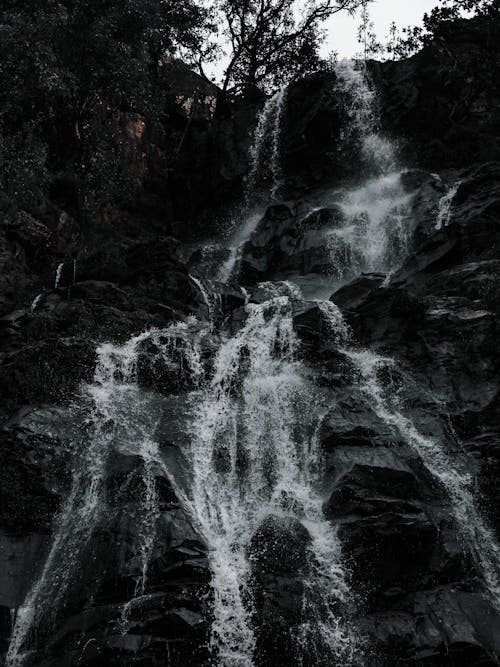 Water Splashing on Black Rock