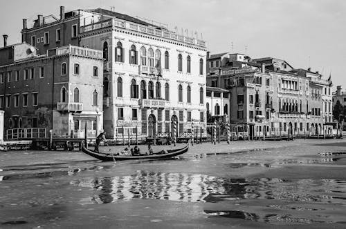 Grayscale Photo of Buildings Beside the Grand Canal