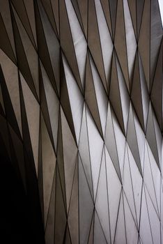 Striking geometric facade of a modern art museum with a minimalist design in Lyon, France.
