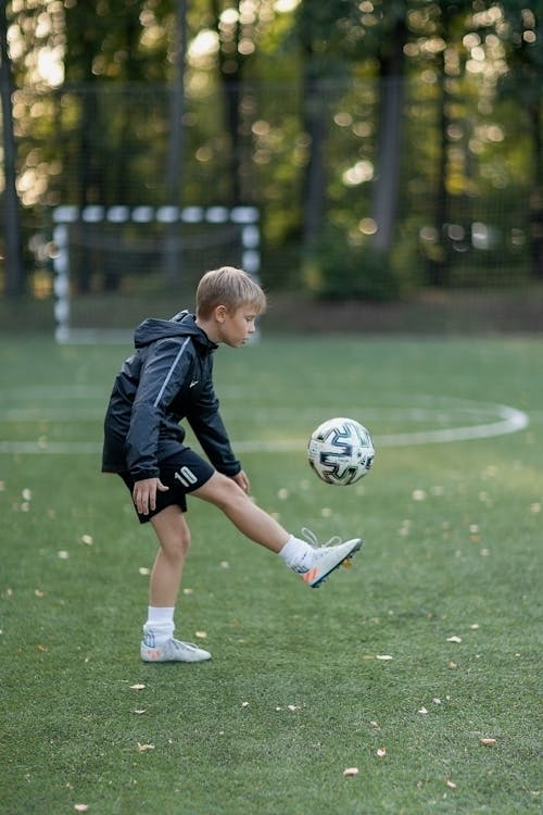 Boy Playing with a Soccer Ball