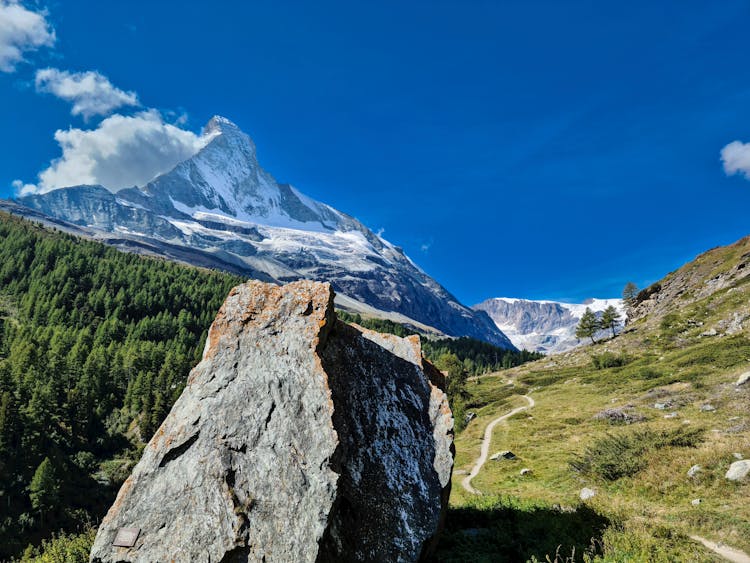 Landscape Of A Valley And The Matterhorn Mountain In Alps 