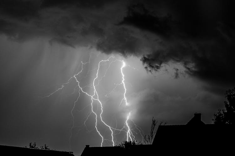 Grayscale Photo Of Lightning In The Sky