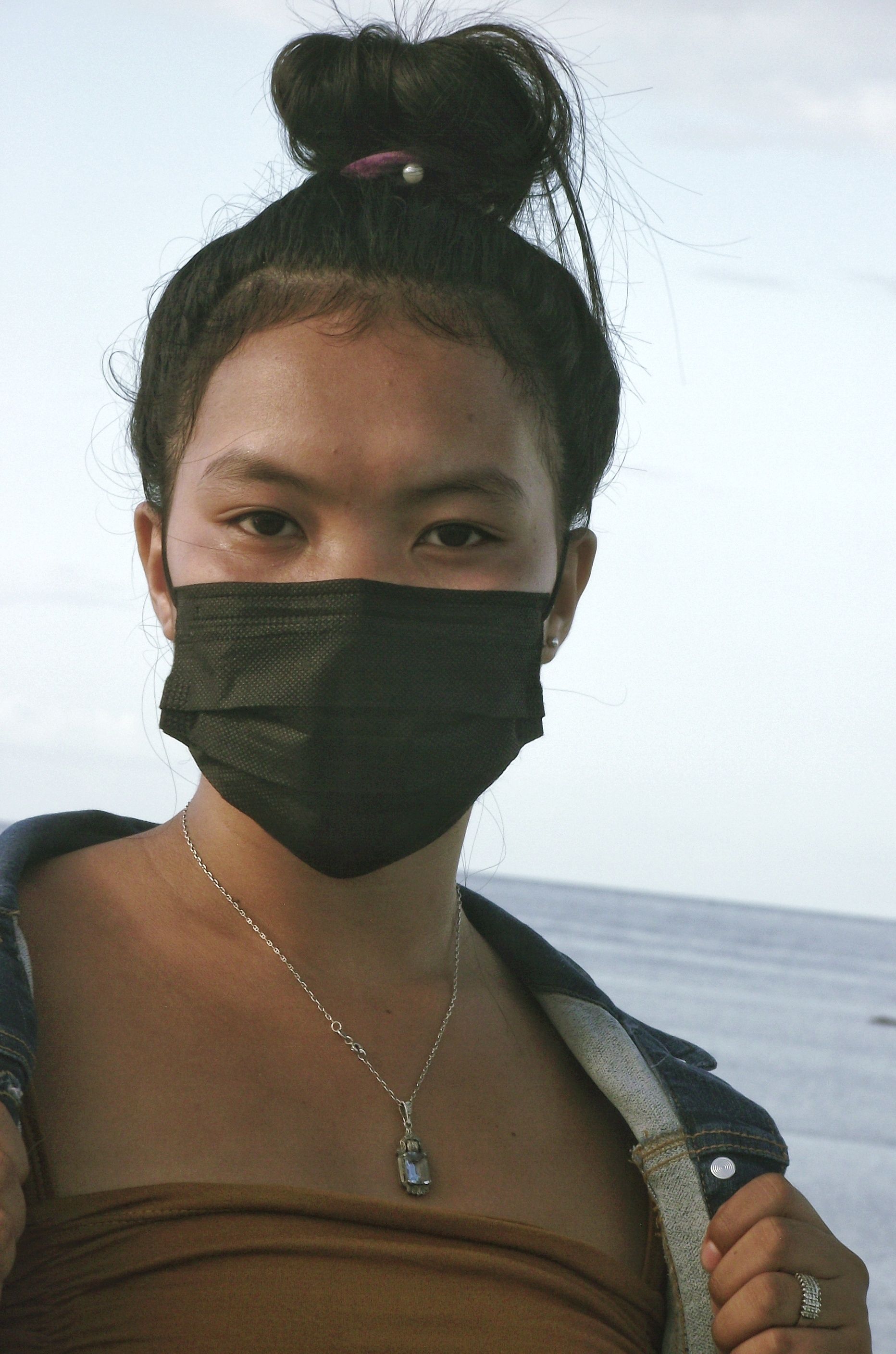 Close Up Photo of a Woman Wearing Face Mask · Free Stock Photo