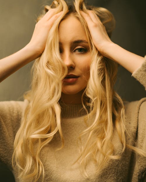 Close-Up Shot of a Pretty Blonde-Haired Woman 