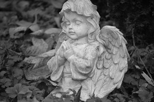 Grayscale Photo of an Angel Statue