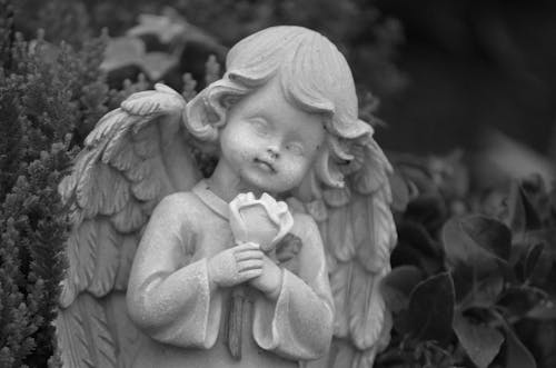 Angel Statue in Grayscale Photography