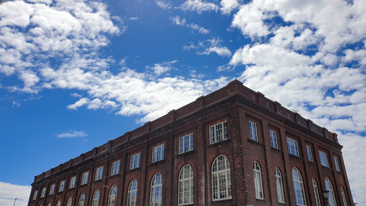 Free stock photo of blue sky, brick building, brick wall