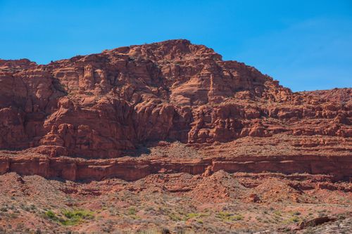 Free Explore the breathtaking red rock formations of this scenic desert canyon under a clear blue sky. Stock Photo