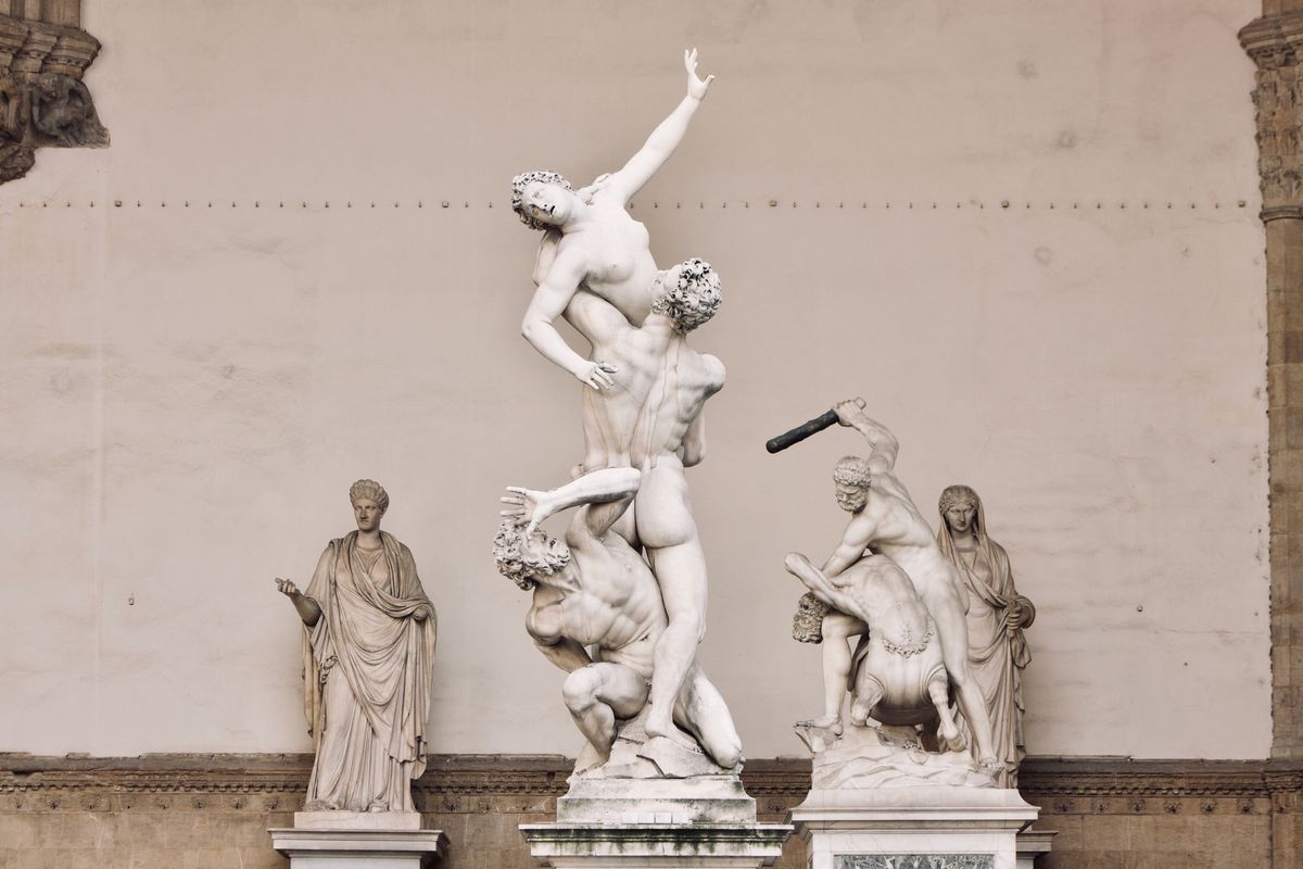 Loggia dei Lanzi Florence with marble sculptures Cellini Perseus Giambologna Sabines under Gothic arches