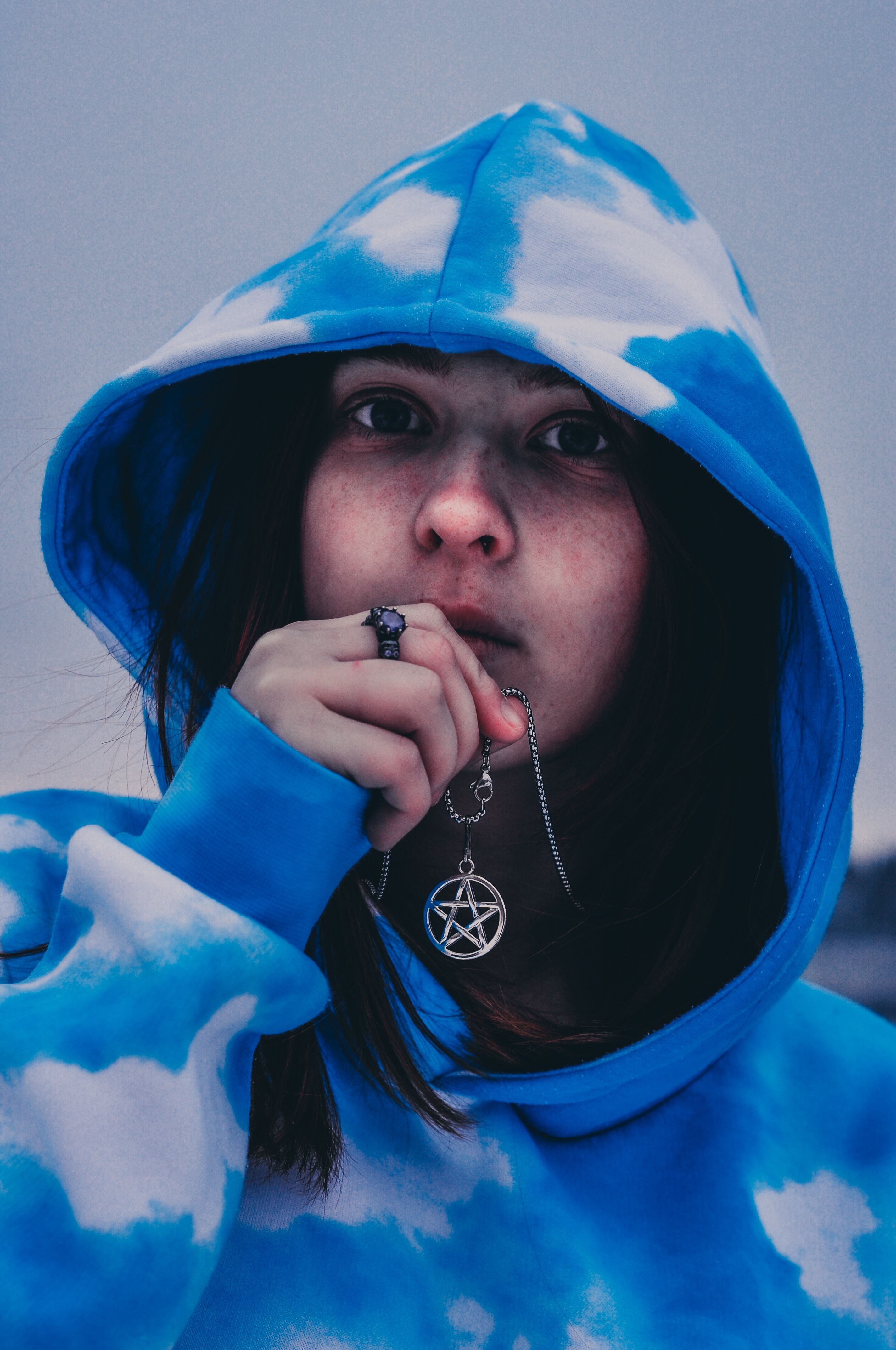 Close-Up Shot of a Woman in Blue Hoodie · Free Stock Photo