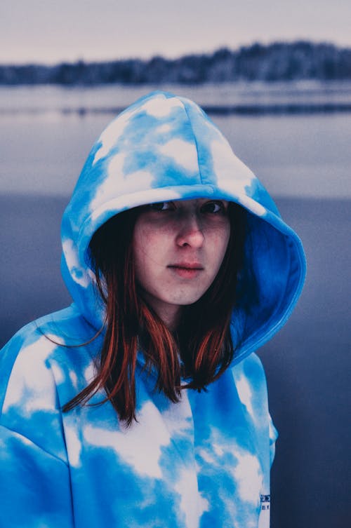 Woman in Blue and White Hoodie
