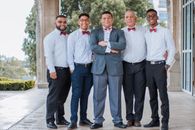 Groom Standing Beside His Fiends
